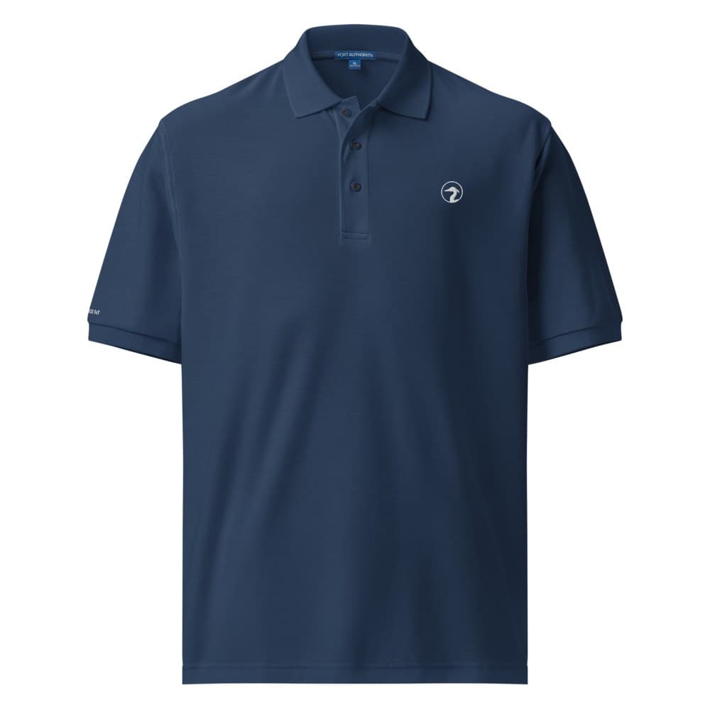 A pique polo with the Bushwacker Bay heron circle logo embroidered on the left chest